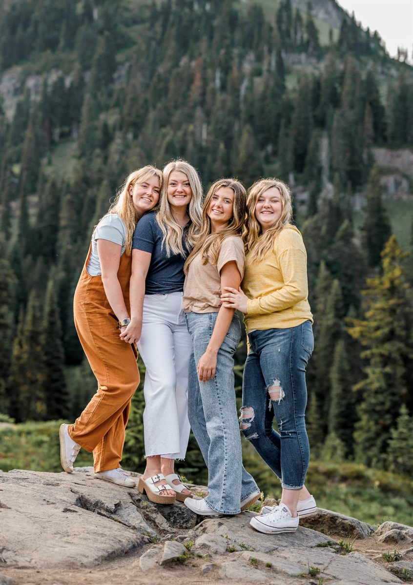 The four granddaughters together on a mountain overlook