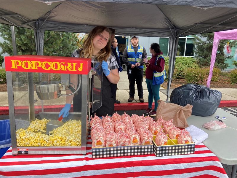 Popcorn machine and concession table at an event