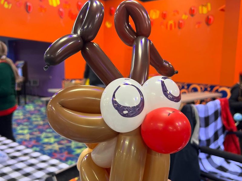 Balloon reindeer sculpture with a red nose